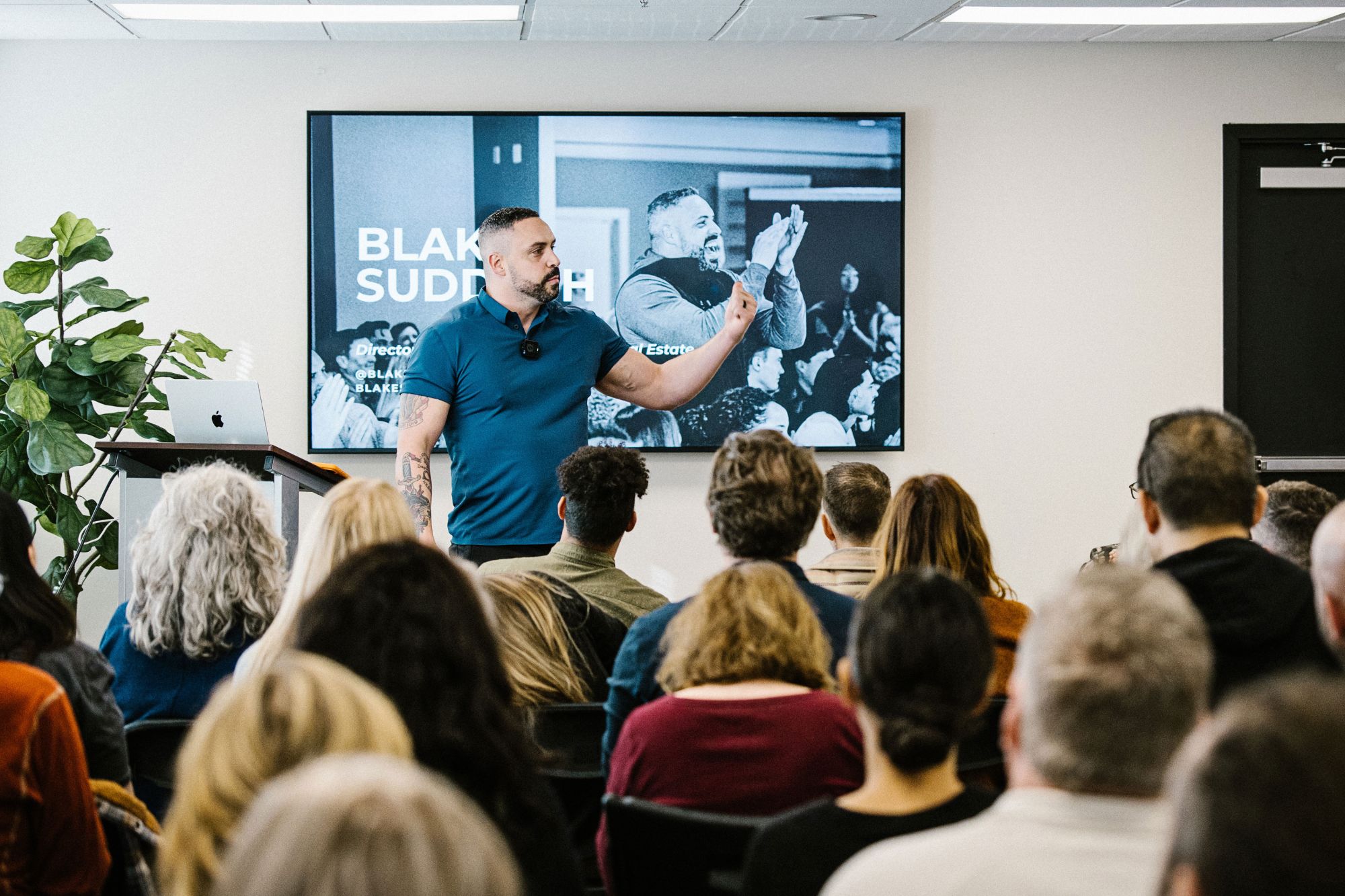 Blake coaching a room of agents